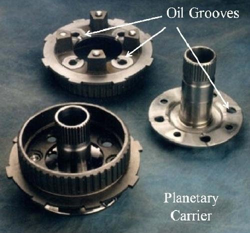 Figure 7 - Planetary carrier and assembly depicting grooves and notches requiring burr removal.