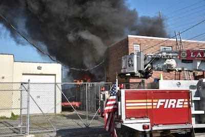 The roof at Tronic Plating in Farmingdale, New York, collapsed after a fire broke out around 5:00 p.m. on a Friday.
