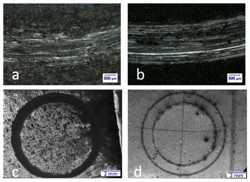Figure 8. Optical microscopic images of a part of the wear track of porous (M5, (a)) and nonporous (M4PT, (b)) samples at 100× magnification (a,b). In the case of M5, the wear mark is more fragmented and not as continuous as in the case of M4PT. The reason for this is that while the hardness of M5 is 508 HV, the hardness of M4PT is “only” 341 HV. A scanning electron microscope was used to evaluate the wear marks more precisely. The SEM images of porous sample (c) and the nonporous (d) sample at 20× magnification.